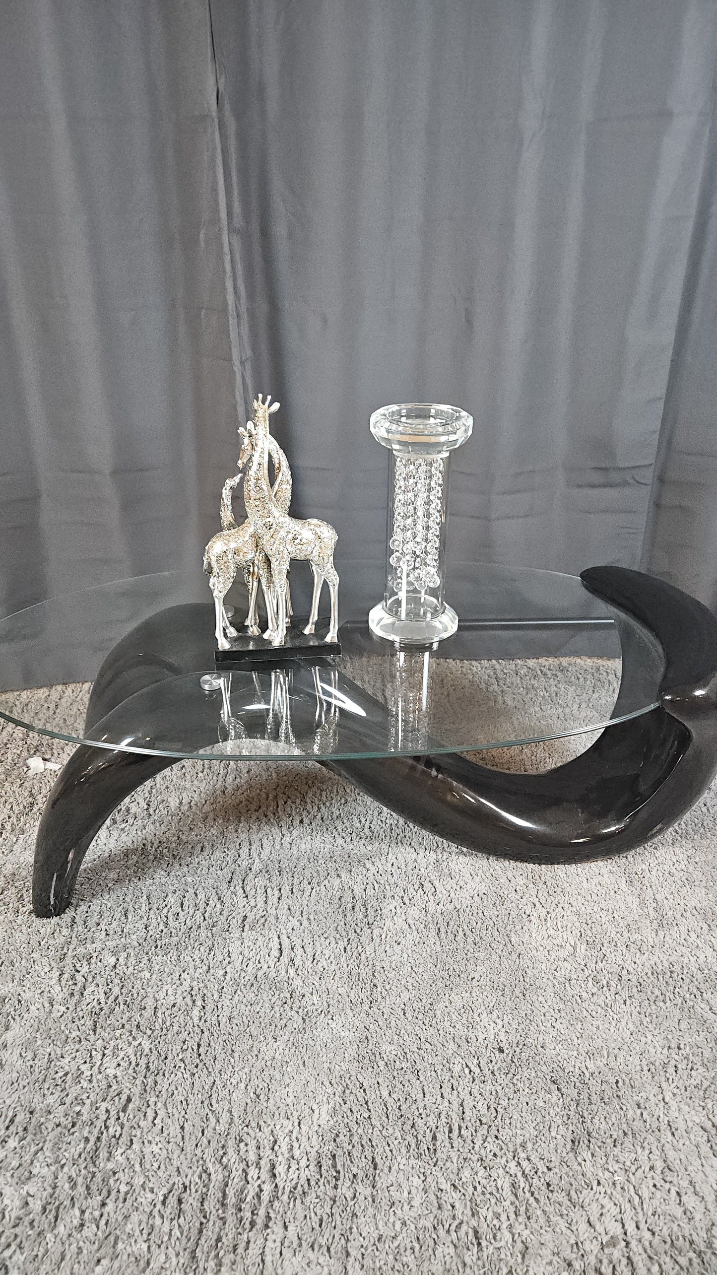 Glass Top Coffee Table with Black Curvy Base